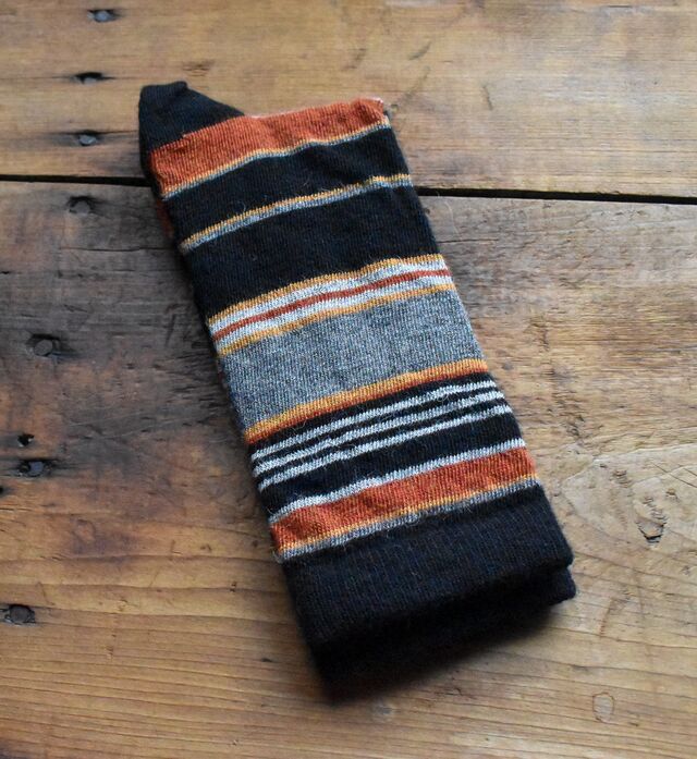 Black with spiced orange and grey stripes