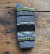 Grey with green, brown and black stripes