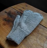 Reverses into solid grey mittens!