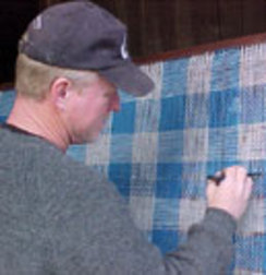 Mike Weaving on a Triangle Loom
