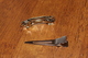 Top: hinged barrette clip, Bottom: alligator clip