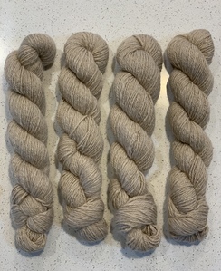 Soft beige/cream colored yarn