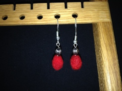 Hanging oval earrings
