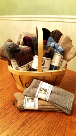 Wide range of alpaca socks, hats, scarves, mitts, and gloves available