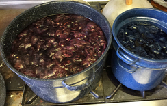 Fleece soaking in a dye bath of two different colors.