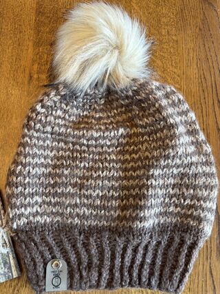 An example of a fun one-of-a-kind beanie. Pom pom is removeable