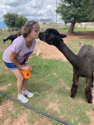 Oprah gives her best kisses today