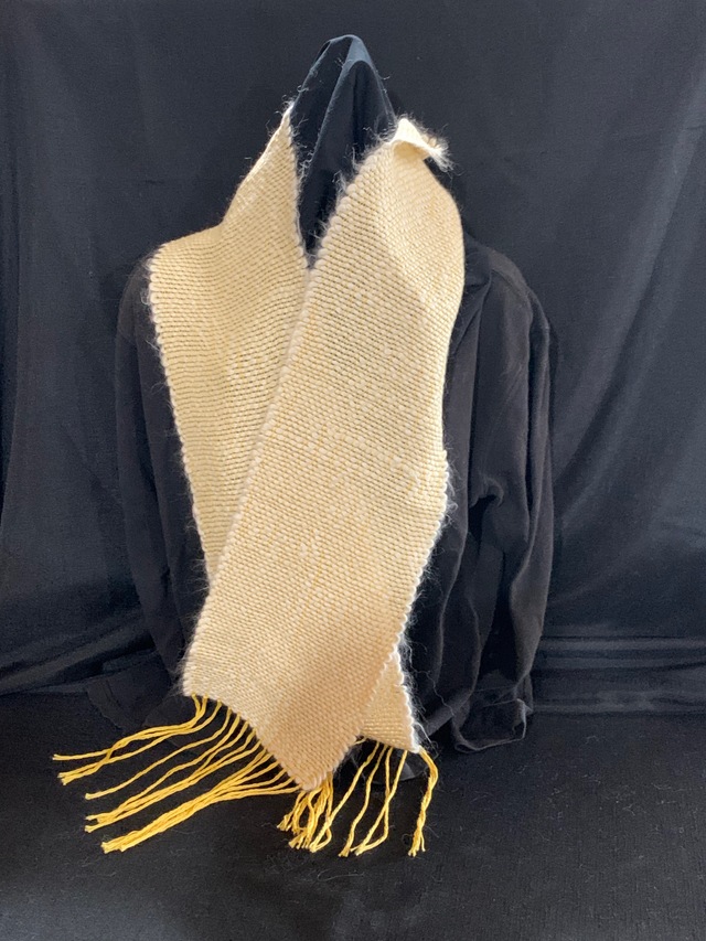 White Suri yarn w/gold cotton warp
