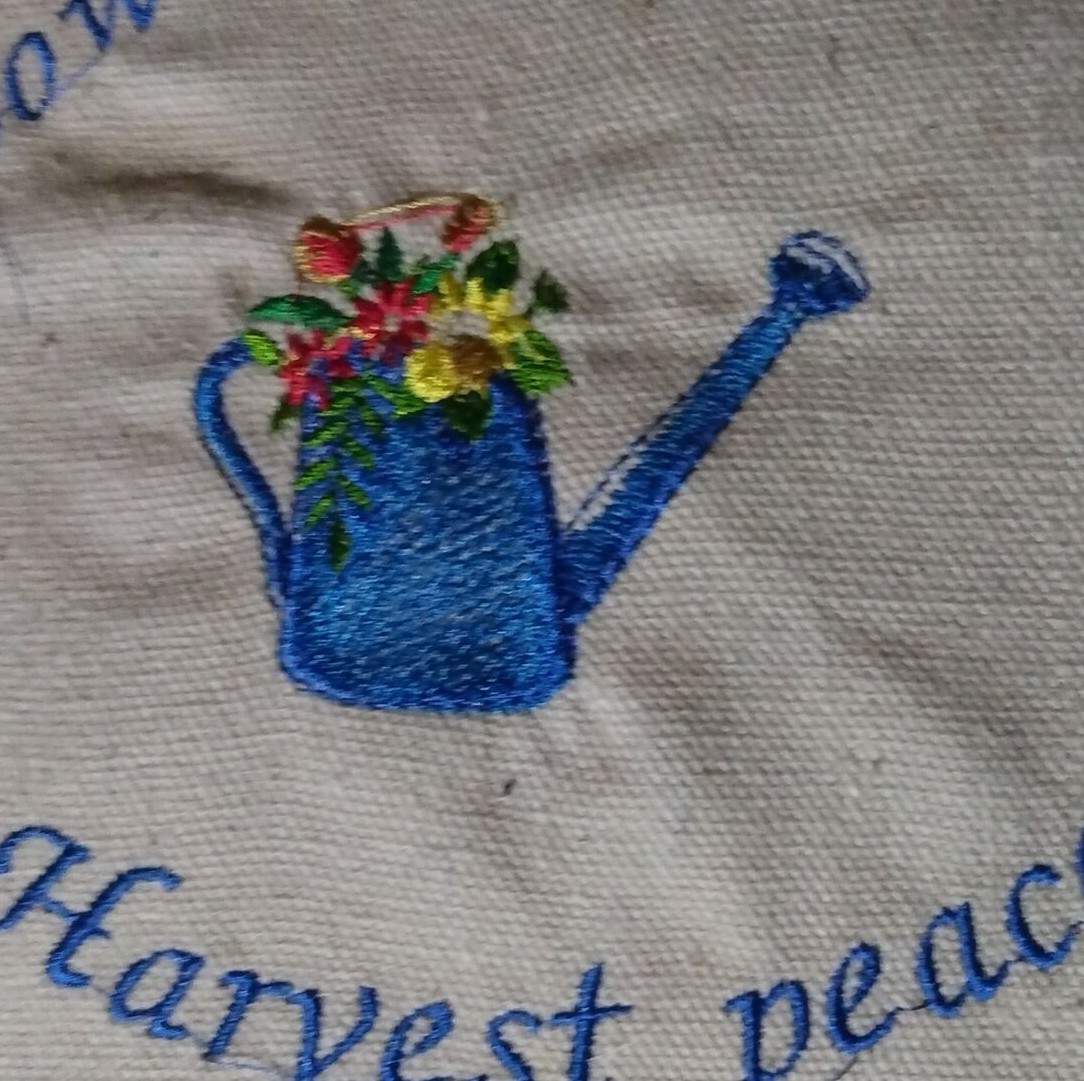 Only flowers and watering can in final embroidery. Email seller for further customization embroidery text 