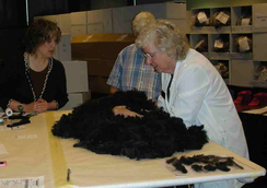 Sara Jane showing fleece features to Marge.