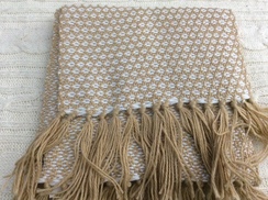 Photo of Woven tan and white scarf 
