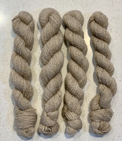 Medium cream colored yarn